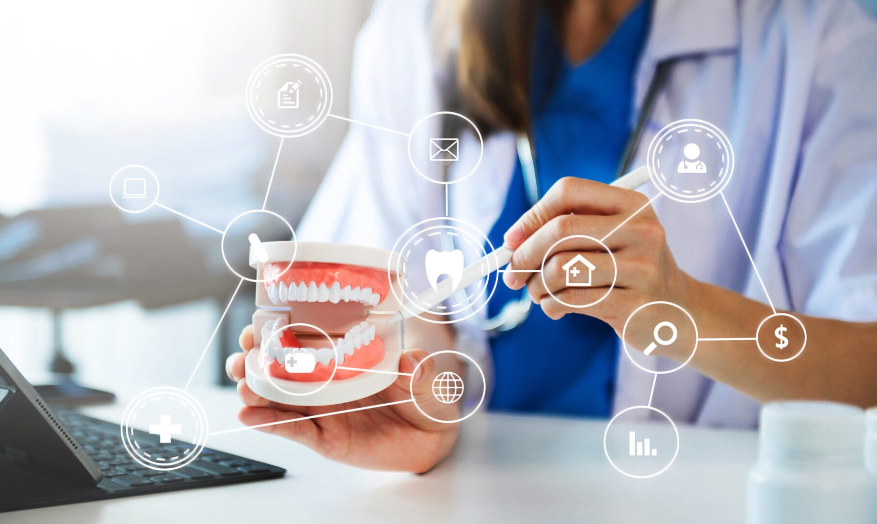 Dentist demonstrating with dental model and icons.