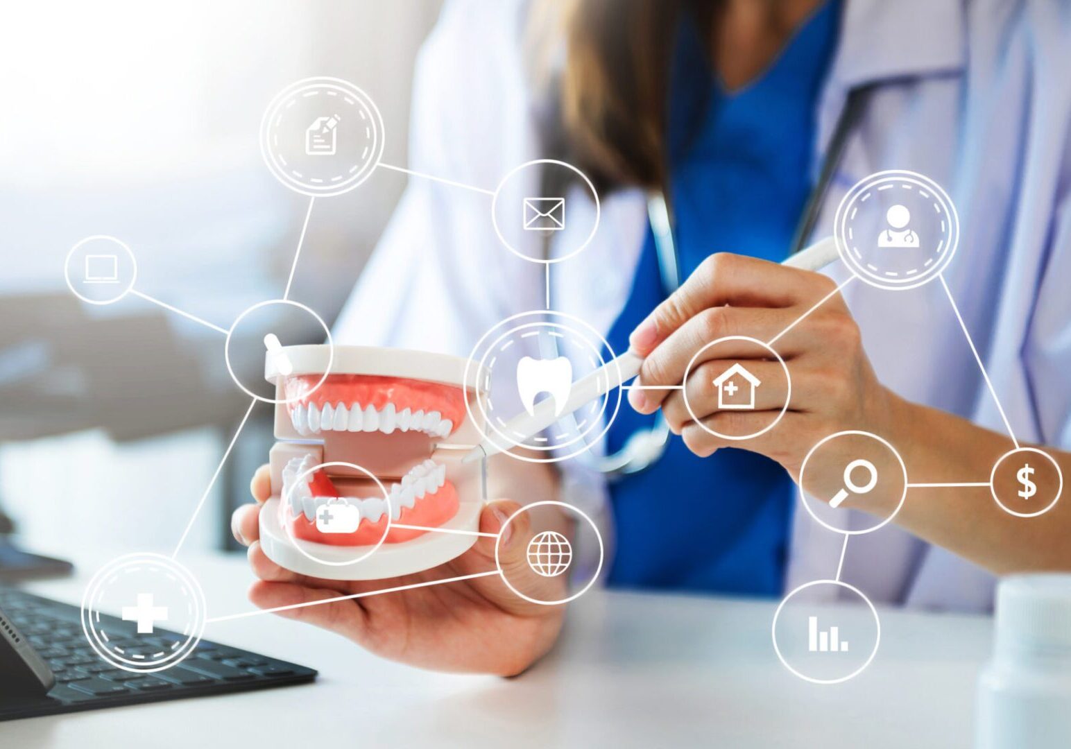 Dentist demonstrating with dental model and icons.